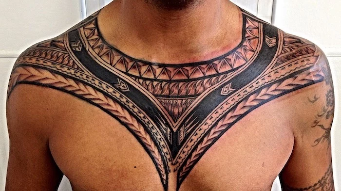 tribal chest tattoo, necklace like, man standing, in front of a white background, simple tattoos for men