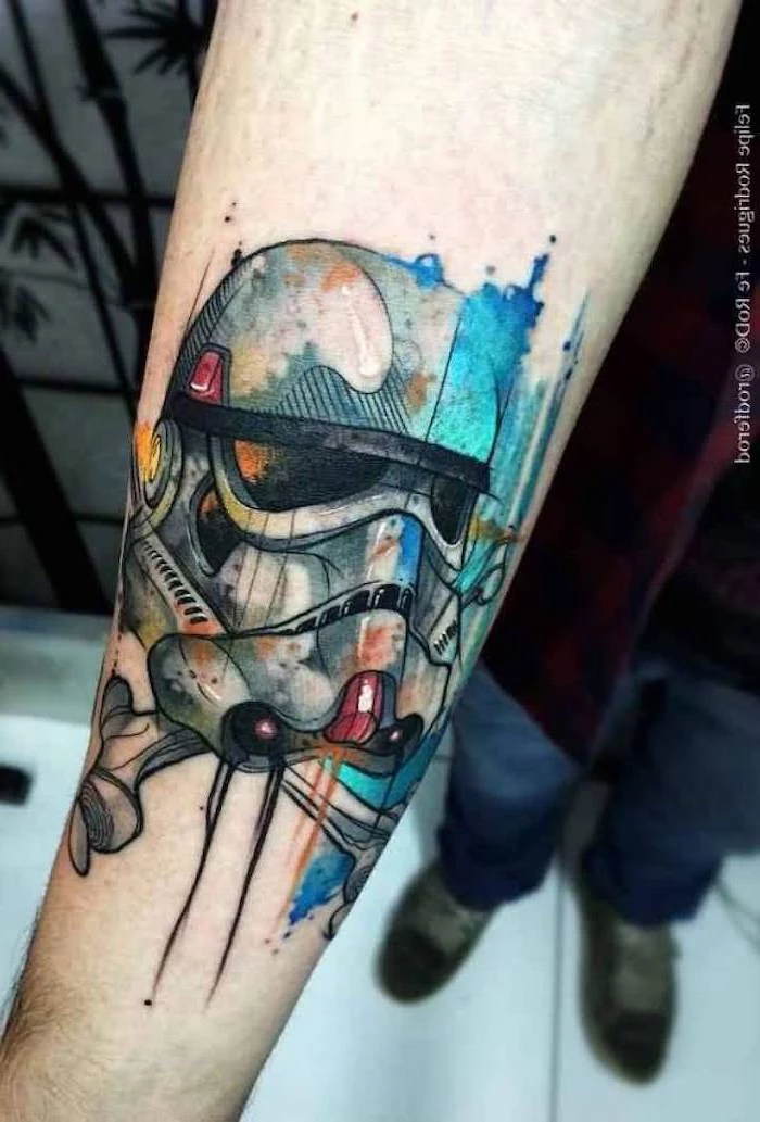 storm trooper, watercolour forearm tattoo, tattoo ideas with meaning, man wearing jeans