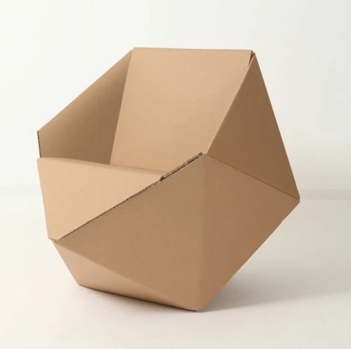 minimalist design, cardboard armchair, how to make a cardboard chair, in front of a white background