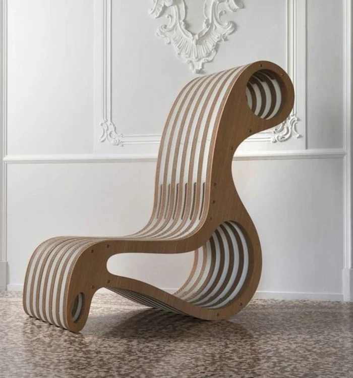 white wall, mosaic floor, intricate design, cardboard armchair, how to make a cardboard chair