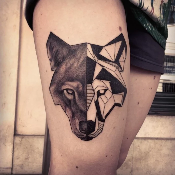 wolf face, half geometrical, half black, geometric owl tattoo, tattoo on a girl's thigh