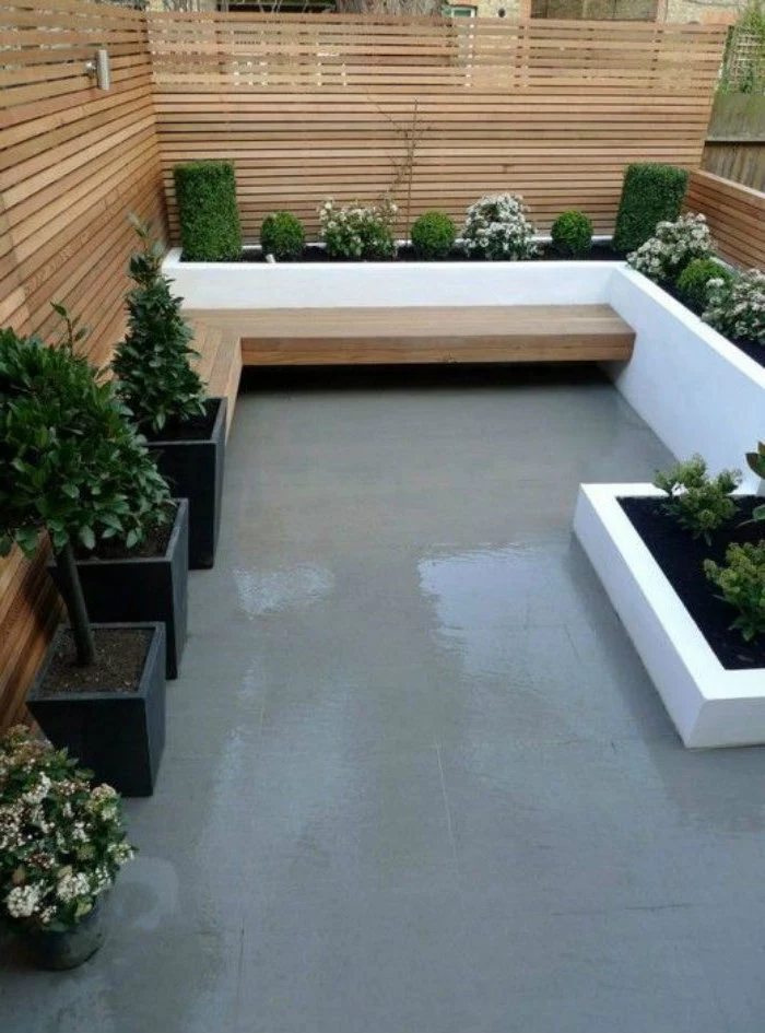 wooden benches, potted plants, small yard landscaping ideas, planted bushes and flowers
