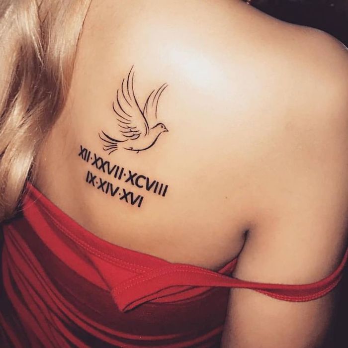 red top, blonde hair, roman numerals, bird shoulder tattoo