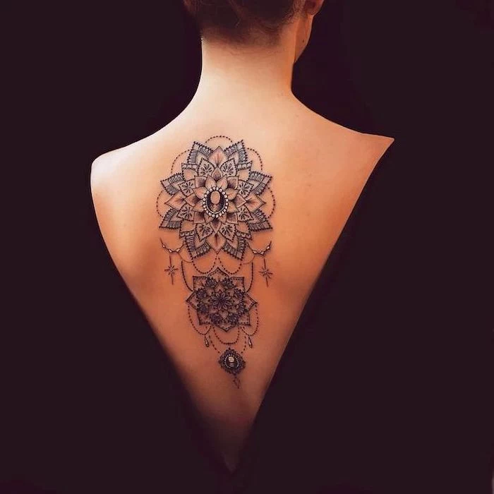 black background, mandala meaning, back tattoo, black dress