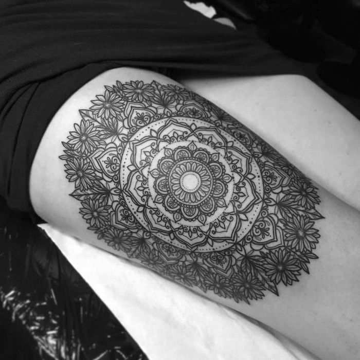 large thigh tattoo, mandala shoulder tattoo, black dress, black background