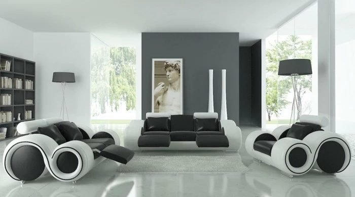 minimalist design, black and white, leather sofas and armchairs, grey wall, colours that go with grey