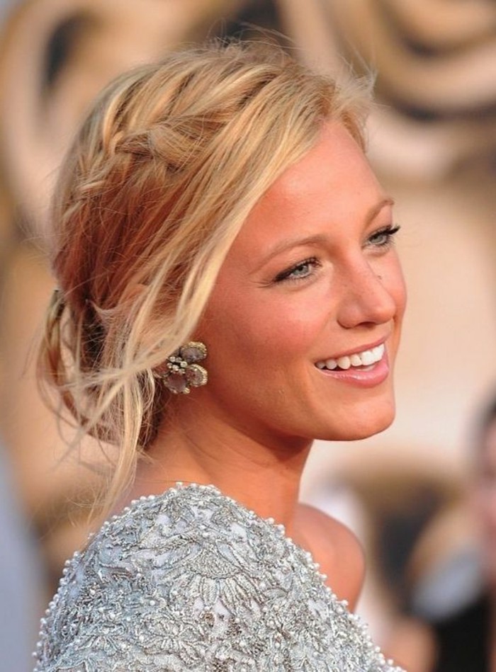 blake lively smiling, blonde hair, in a braided low updo, easy hairstyles for short hair, grey lace dress