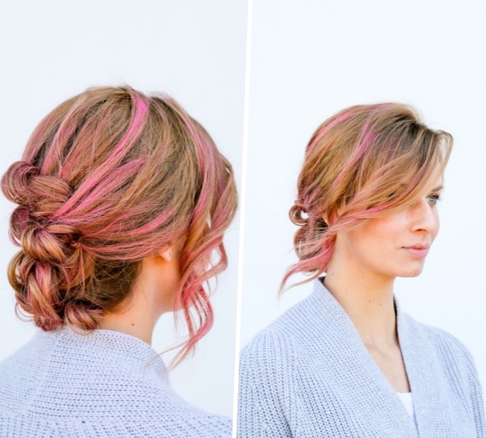 blonde hair, with pink highlights, woman wearing a blue sweater, low updo, braid hairstyles
