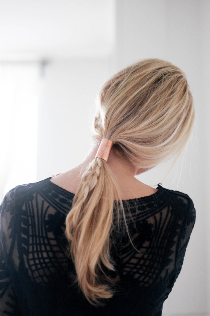 blonde hair, in a braid and low ponytail, braid hairstyles for girls, tied with a brass hair accessory