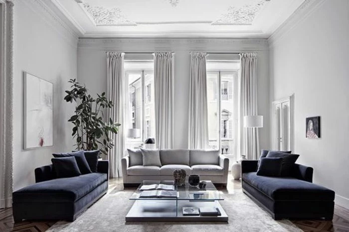 blue velvet sofas, grey sofa, best color for living room walls, white walls, tall ceiling, wooden floor