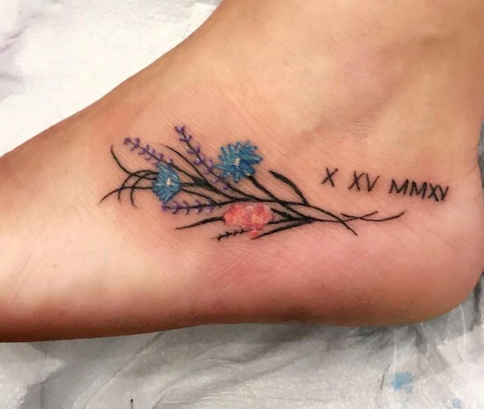 bouquet of flowers, foot tattoo, roman numerals, white paper