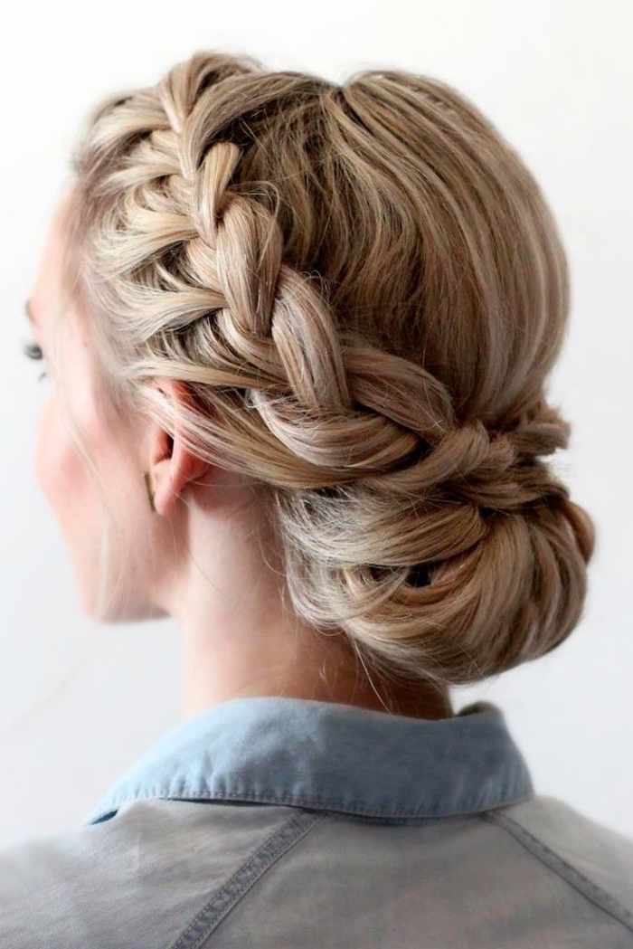 blonde hair, with highlights, in a low updo, braided bun, prom hairstyles for short hair, denim shirt