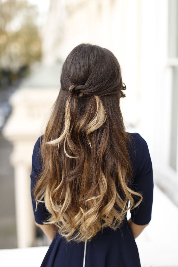 long brown wavy hair, with blonde ends, long haircuts for women, girl wearing a navy blue dress