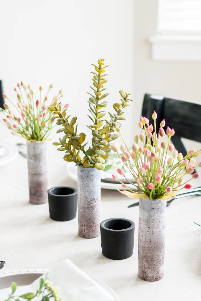 table decoration ideas, cement vases, bouquet of succulents, bouquets of flowers, black candle holders