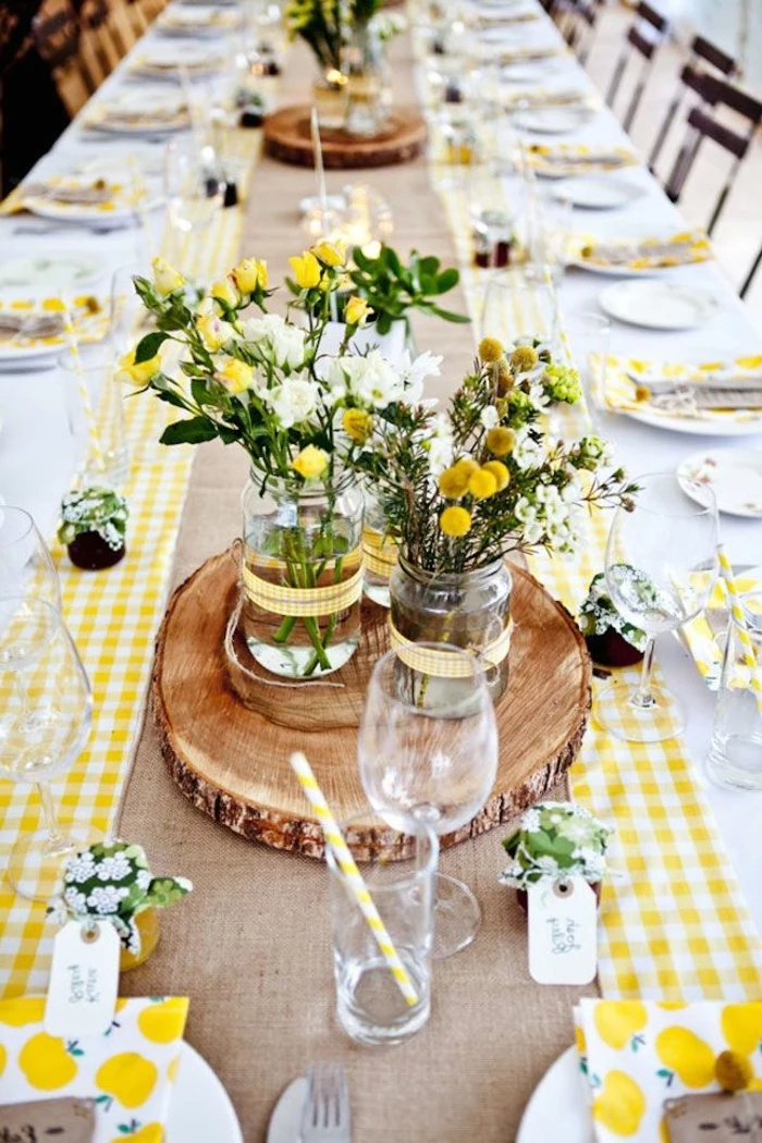 table settings, long table, table setting images, wooden block tray, small jars, spring flower bouquets