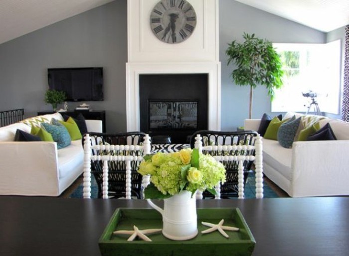 best color for living room walls, a shaped ceiling, white sofas, green and blue, throw pillows, grey walls