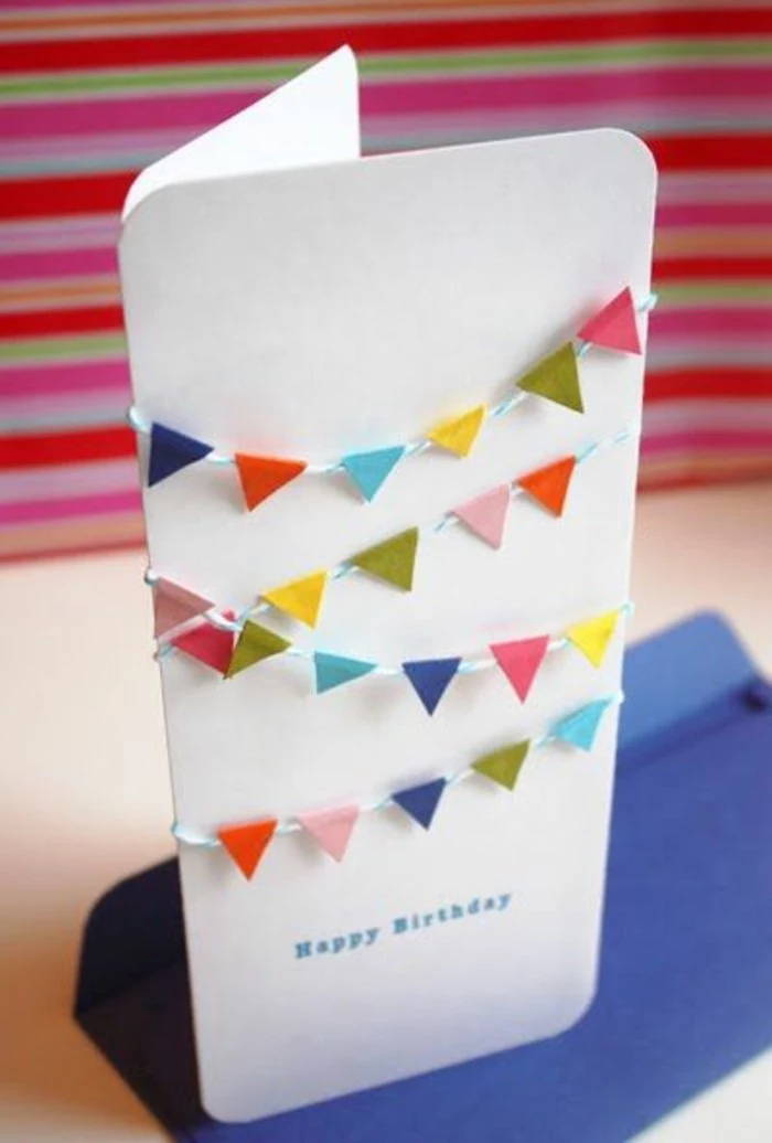 white card stock, colourful garland across, colourful background, birthday card design
