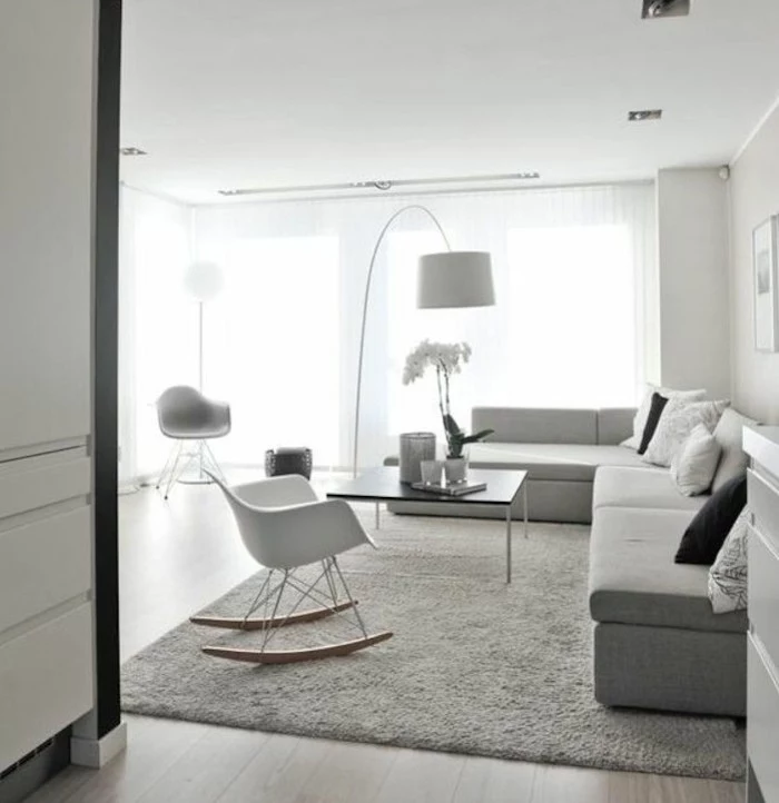 white corner sofa, light grey carpet, best color for living room walls, tall ceiling, white armchairs