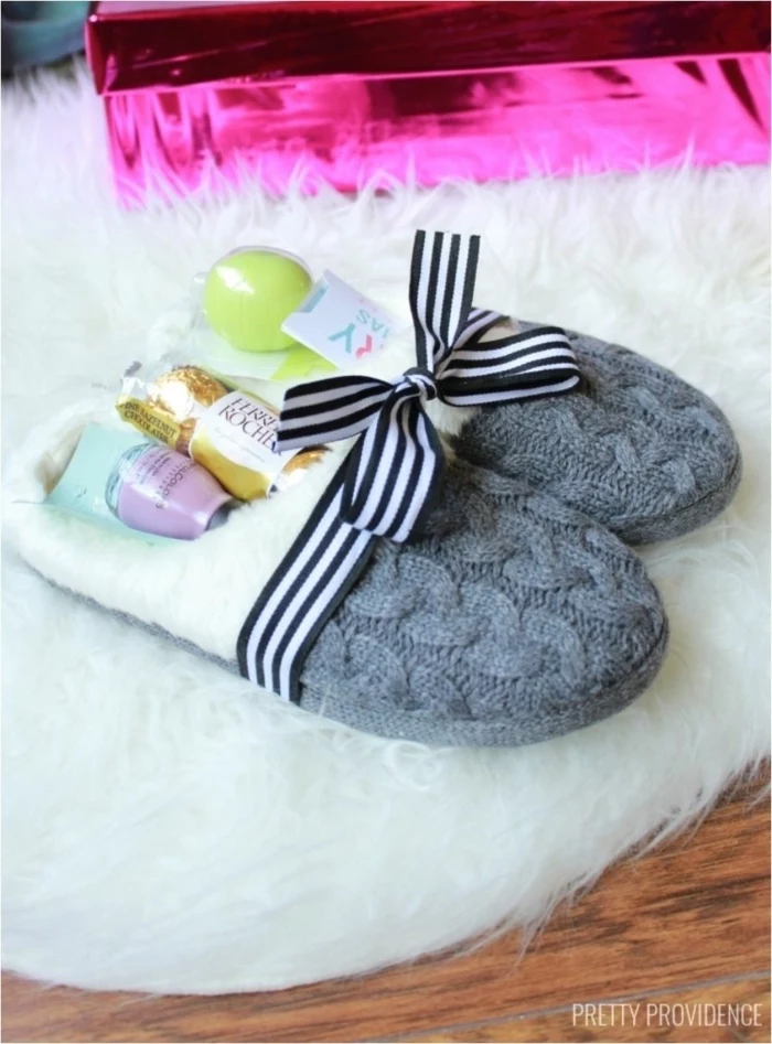 grey knitted slippers, filled with ferrero rocher candy, purple nail polish, eos lip balm, diy gifts for friends