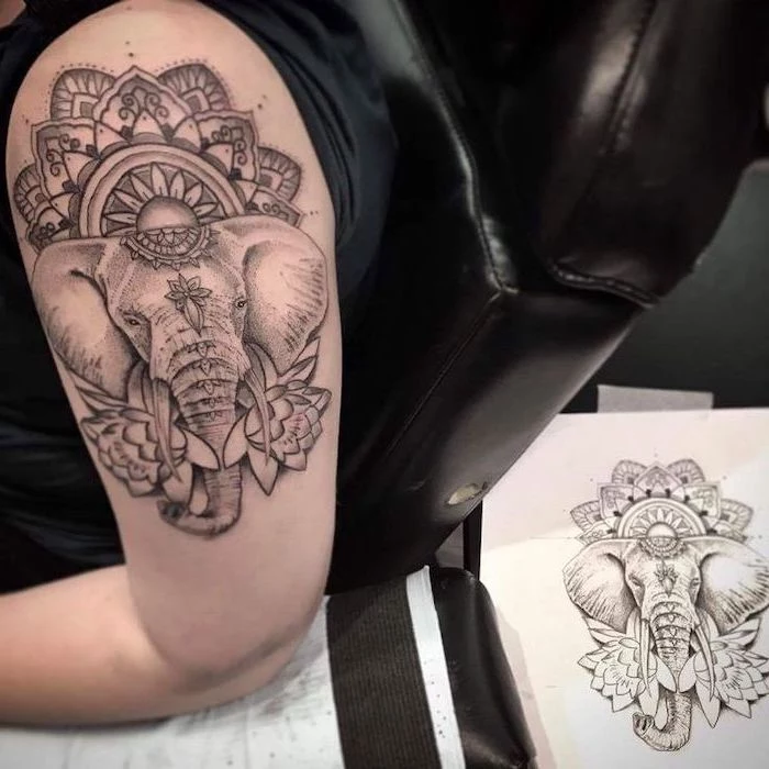 elephant shoulder tattoo, black leather armchair, lotus mandala tattoo, black and white sketch, in the background