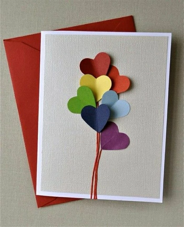 red envelope, how to make a birthday card, colourful hearts, red string, grey card stock