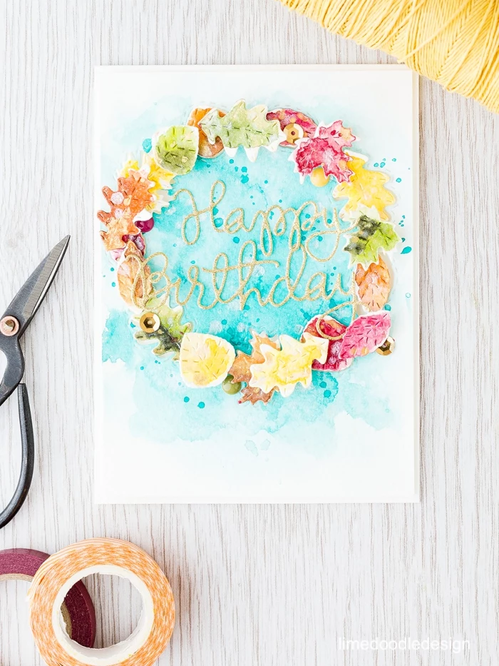 happy birthday, watercolour floral wreath around, diy pop up cards, white wooden table