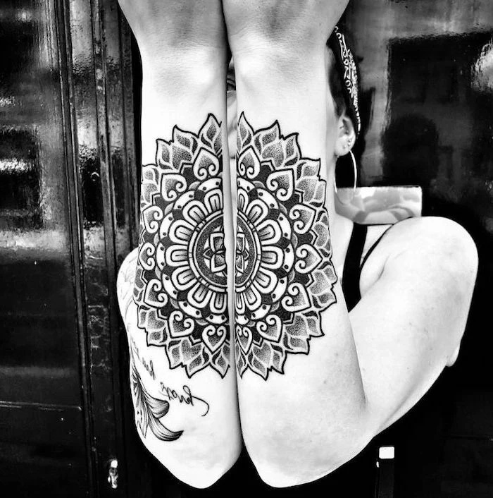forearm tattoos, on both hands, black and white photo, mandala symbols