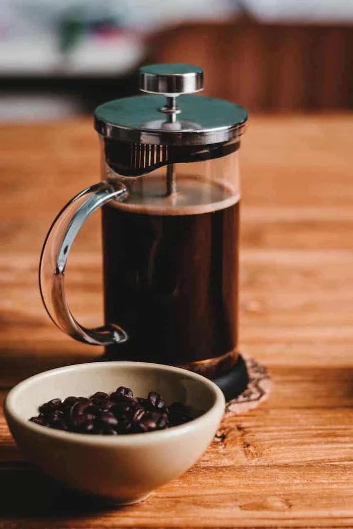 french press, coffee maker, personalized housewarming gifts, coffee beans in a bowl