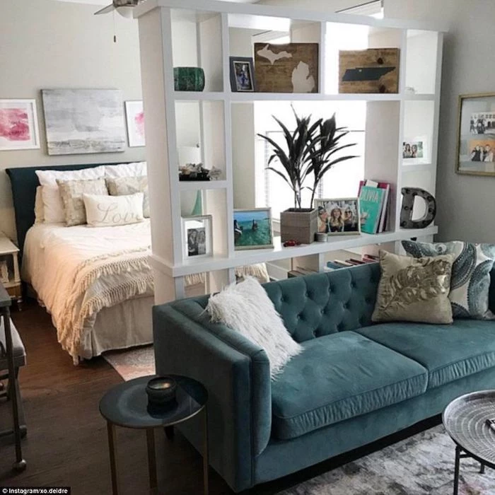green velvet sofa, white bookshelf divider, living room furniture for small spaces, small metal coffee tables