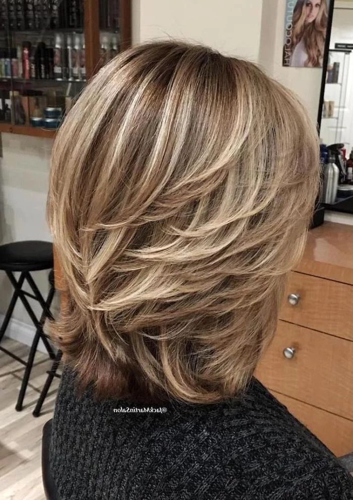 blonde hair, with highlights, easy hairstyles for short hair, black sweater, black stools