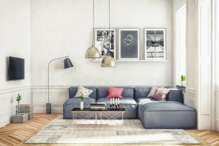 gray and white living room, grey corner sofa, wooden floor, black wooden coffee table