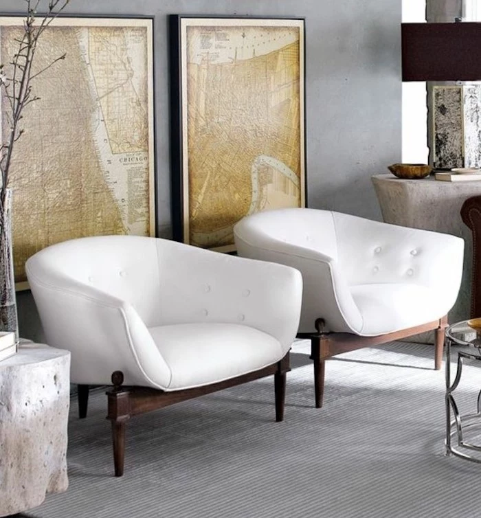 white leather armchairs, framed vintage maps, colors that go with gray walls, grey carpet