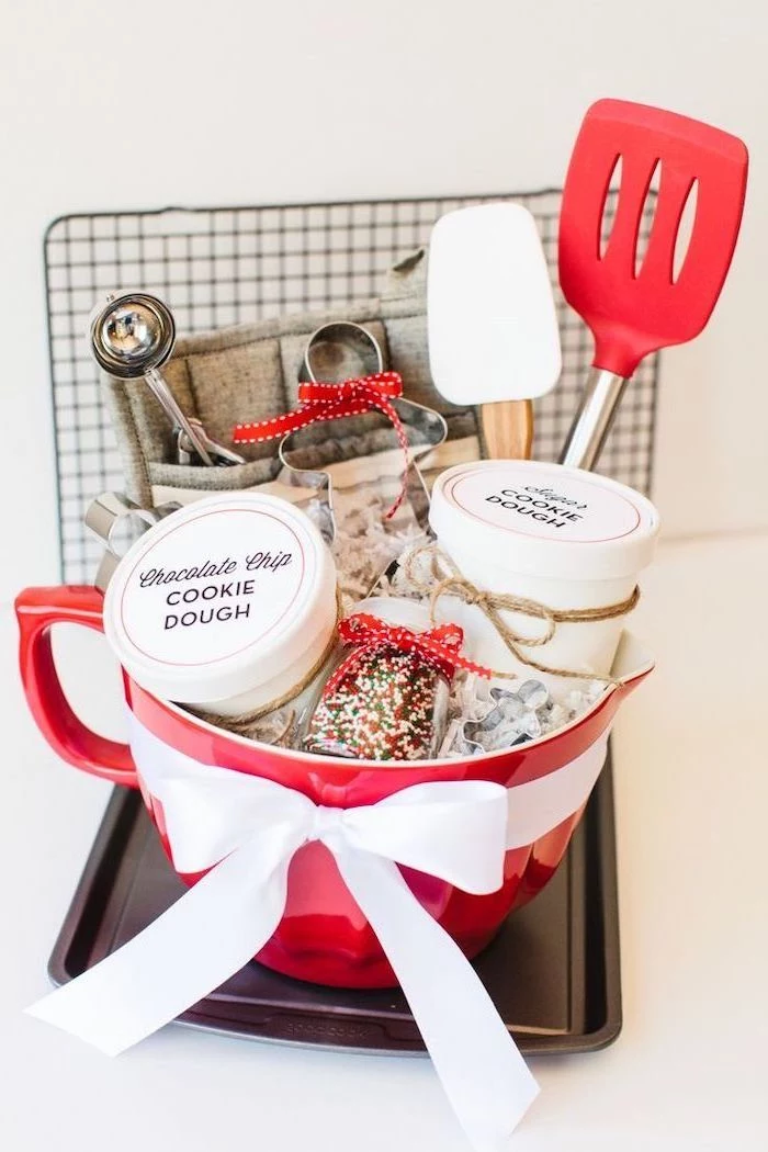 practical housewarming gifts, large red bowl, white and red spatulas, chocolate chip, cookie dough
