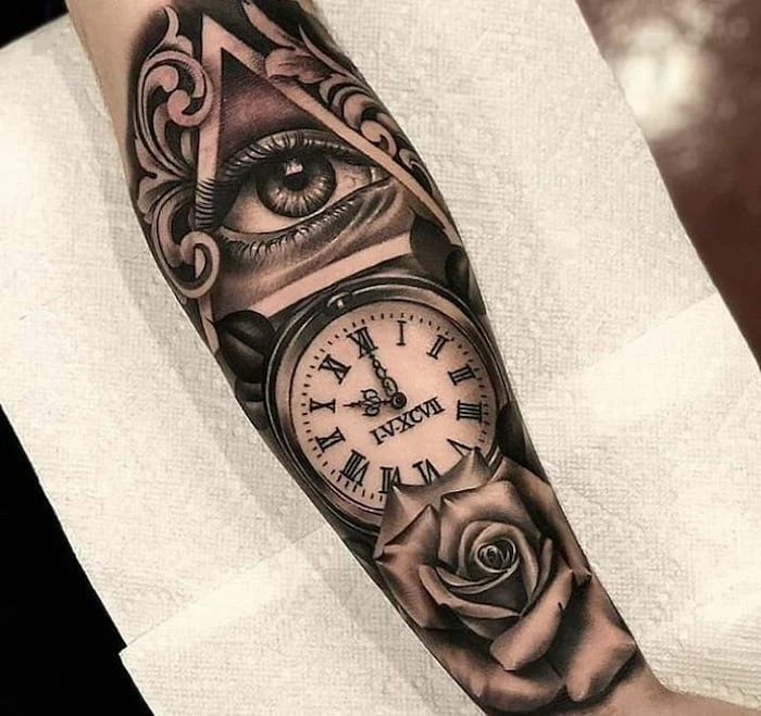 illuminati eye, clock and a rose, forearm tattoo, roman numeral wrist tattoo