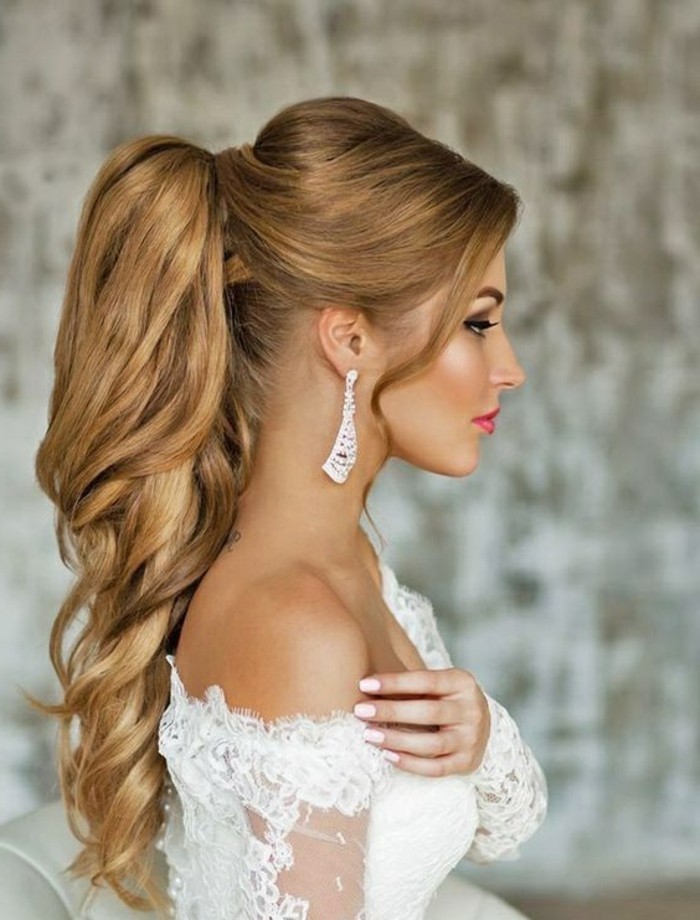 long blonde hair, in a high wavy ponytail, prom hairstyles down, white lace dress, white hanging earrings