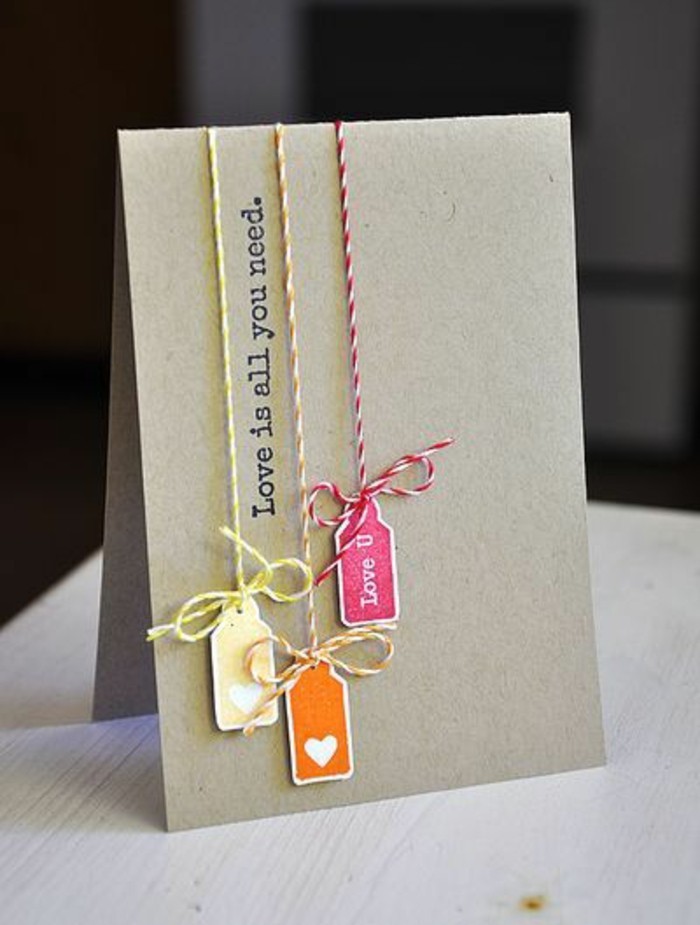 love is all you need, yellow orange and pink, gift tags, homemade birthday card ideas, wooden table