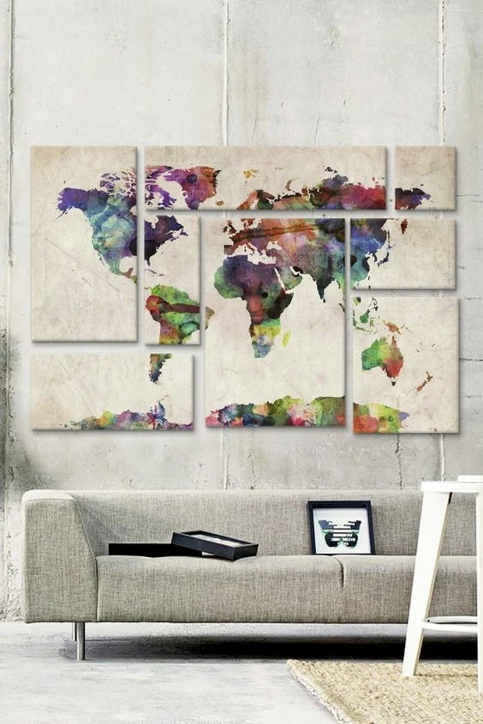 separate canvases, forming the map of the world, big wall decor, hanging over a grey sofa