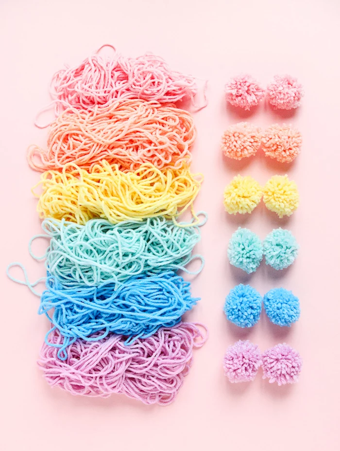 colourful yarn, cute gifts for boyfriend, colourful pom poms, pink background, step by step, diy tutorial