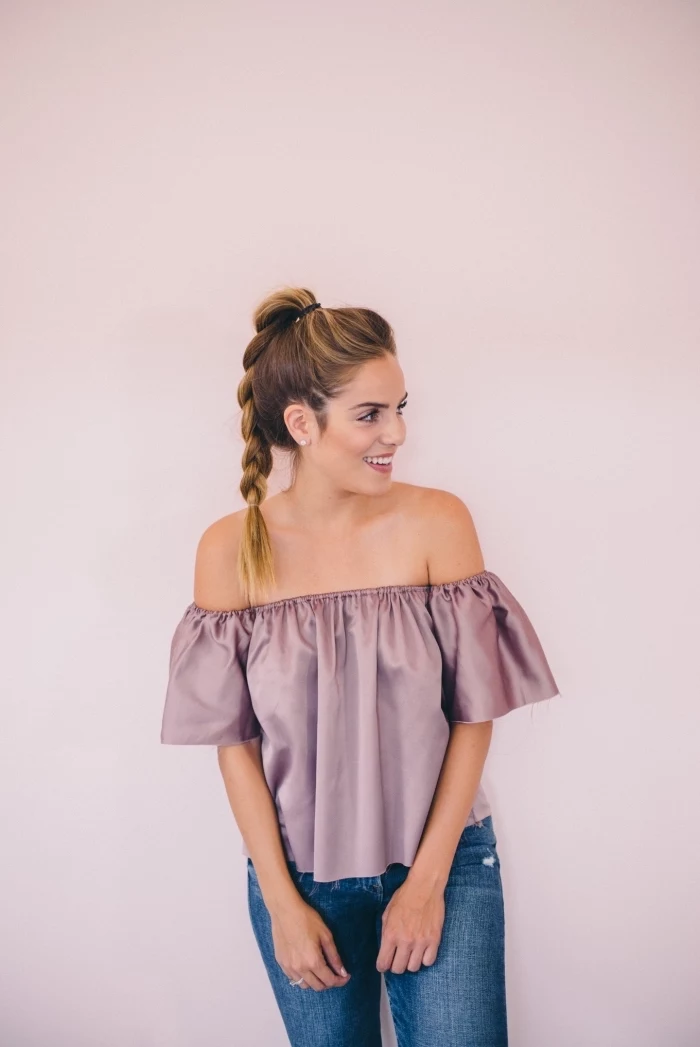 girl wearing a purple satin top and jeans, brown hair, with highlights, in a high braided ponytail, bridesmaid updos