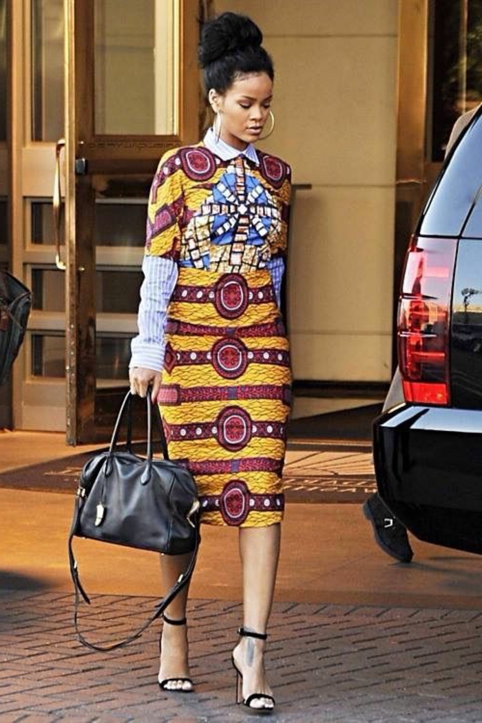 rihanna walking, down a paved street, mid length dress, blue shirt, african dresses, black car