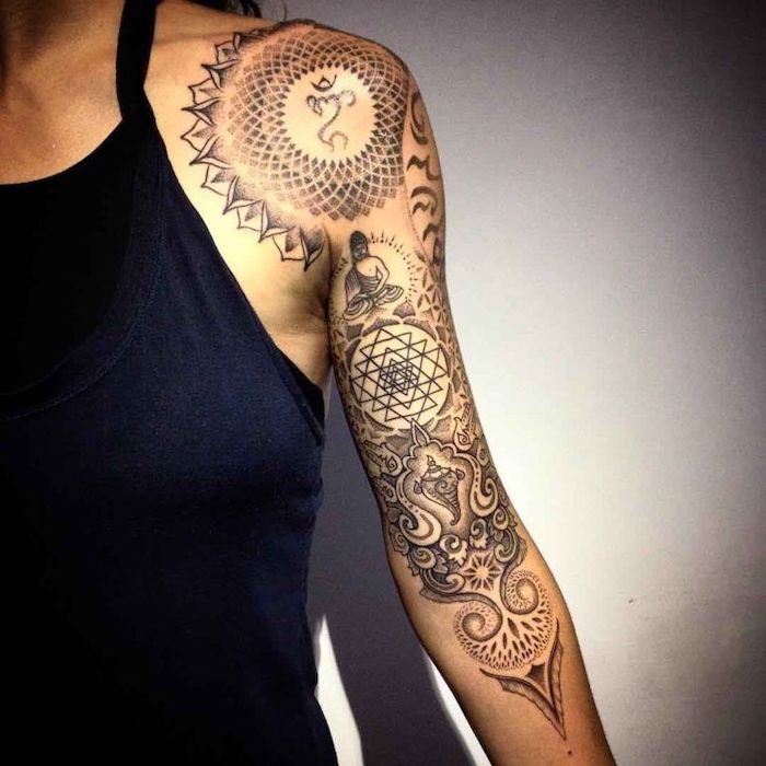 black top, mandala thigh tattoo, white background, shoulder and arm tattoo