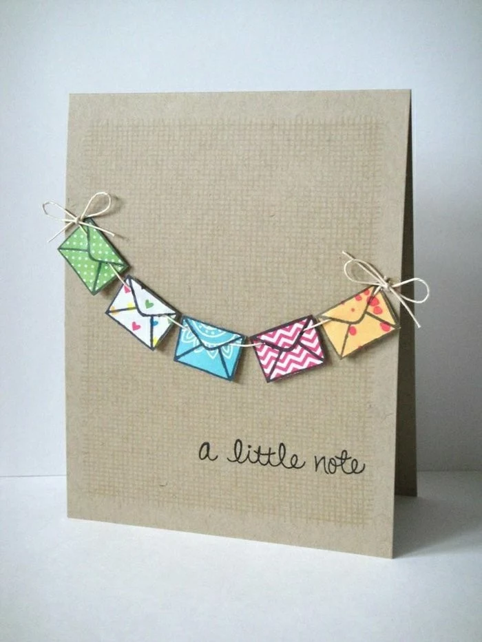 colourful garland, made out of envelopes, a little note, card making ideas, white background