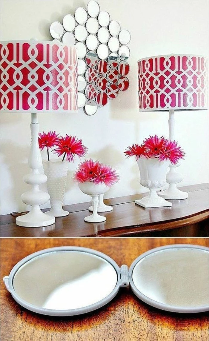 small round mirrors, arranged together, hanging on a white wall, girls wall decor, red lamp shades