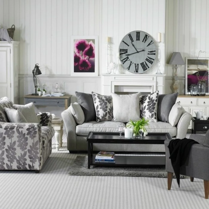 grey couch living room, metal black coffee table, vintage clock, above the fireplace, grey carpet