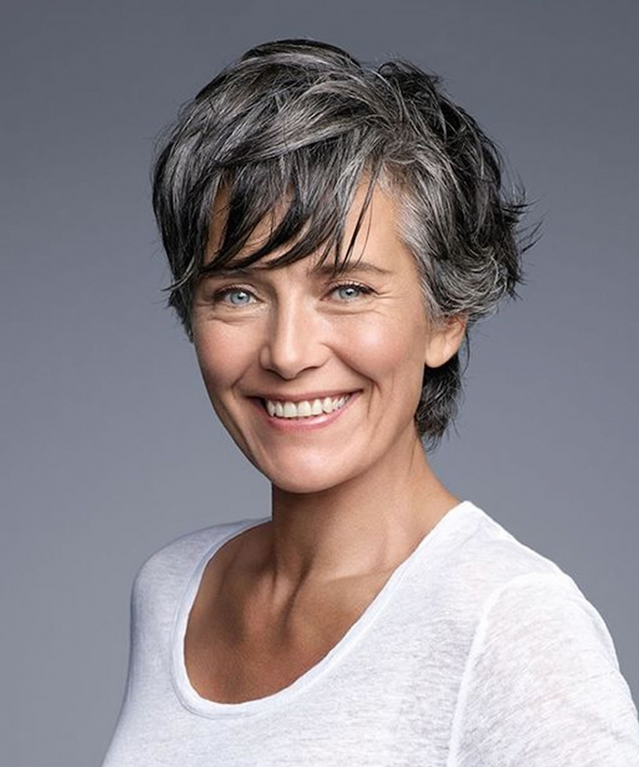 silver grey hair, short length hairstyles, white top, grey background, pixie cut