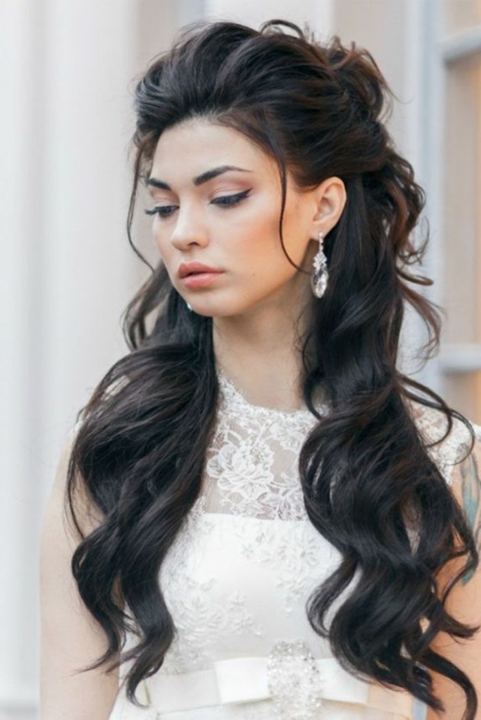 hairdos for long hair, long black wavy hair, large crystal hanging earrings, white lace dress