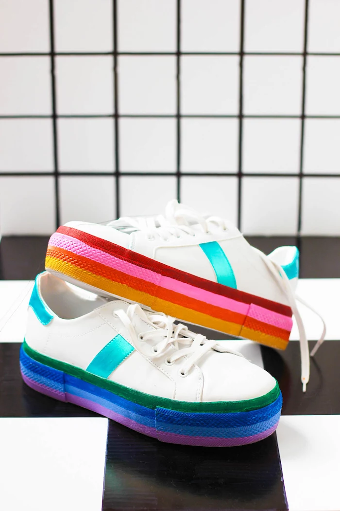 thoughtful gifts, white sneakers, rainbow coloured soles, white and black, tiled background