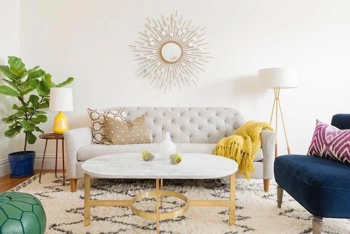 white sofa, brass metal coffee table, marble countertop, how to arrange furniture, blue velvet armchair
