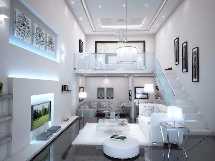 two level studio apartment, how to arrange furniture, white and grey sofas, black tiled floor, white walls