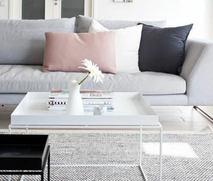 popular living room colors, white metal coffee table, grey sofa, white pink and black, throw pillows